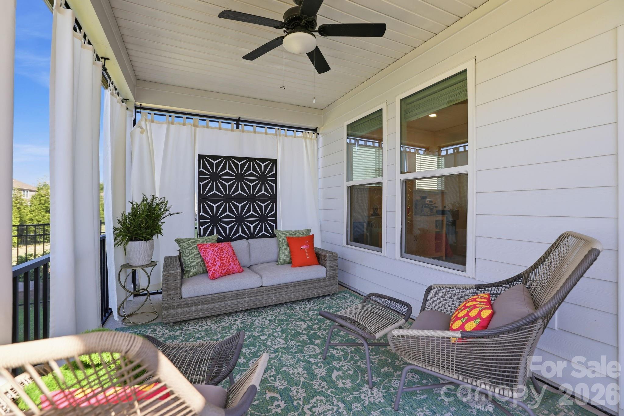 6038 Holland Street Fort Mill, SC 29707 - Photo 25 of 48 a outdoor living space with furniture and a potted plant