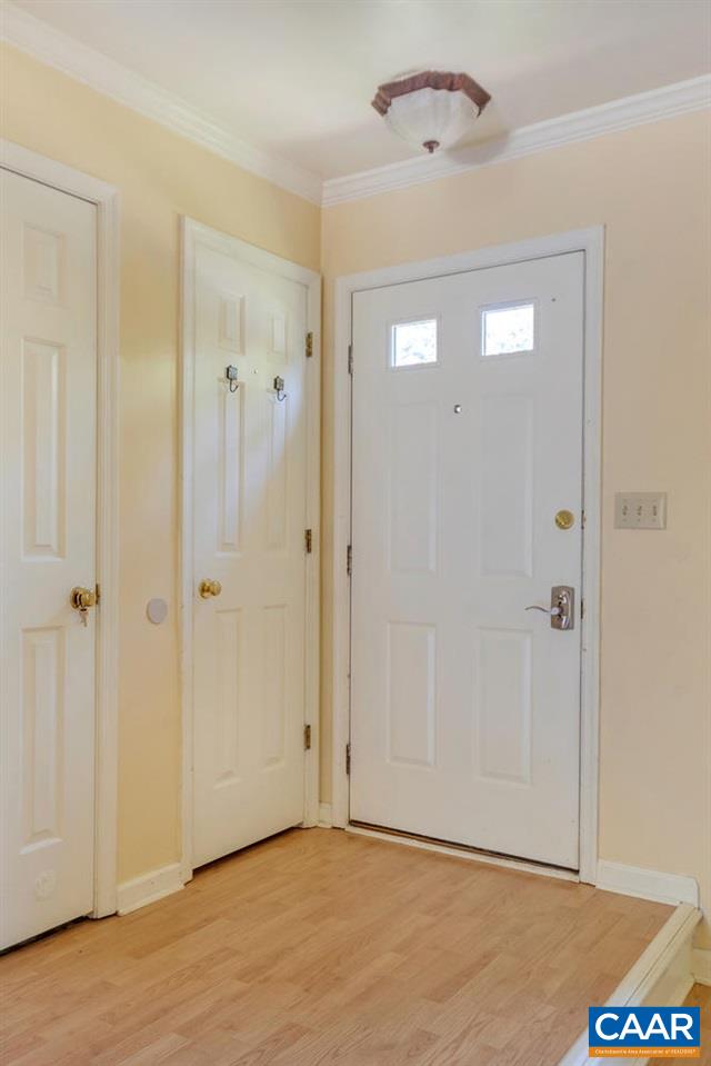 1463 Minor Ridge Court Charlottesville, VA 22901 - Photo 4 of 24 a view of an empty room with closet and a ceiling fan