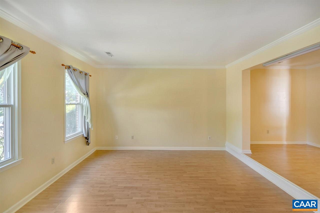 1463 Minor Ridge Court Charlottesville, VA 22901 - Photo 9 of 24 a view of empty room with wooden floor and fan