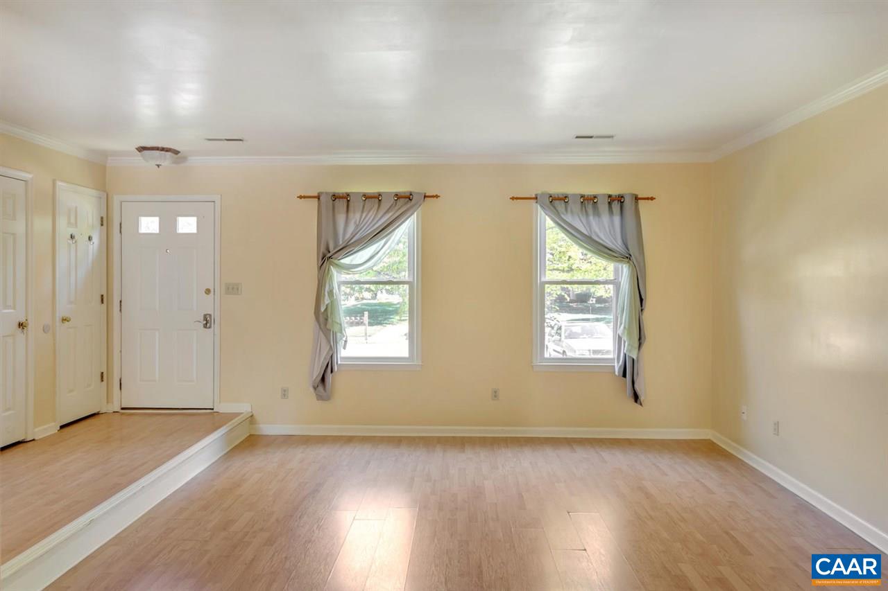 1463 Minor Ridge Court Charlottesville, VA 22901 - Photo 10 of 24 an empty room with wooden floor and windows