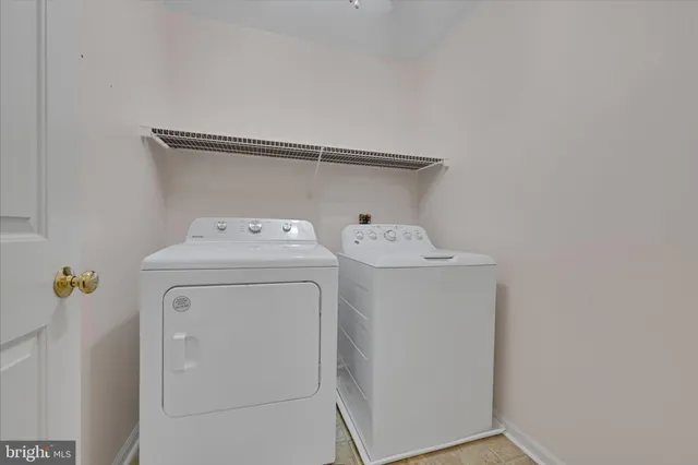 a view of a chairs on the roof deck