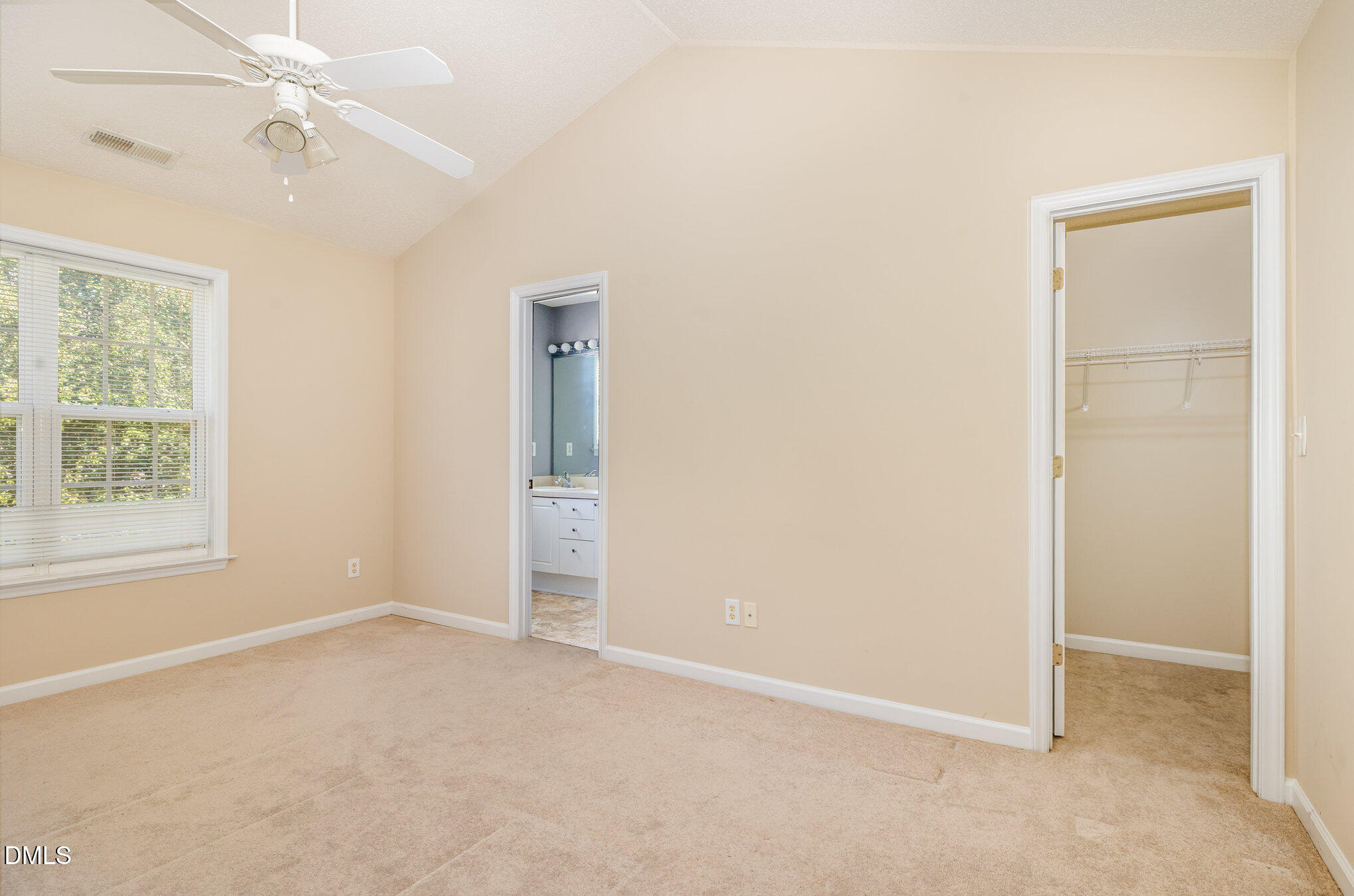 2116 Metacomet Way Raleigh, NC 27604 - Photo 14 of 24 an empty room with windows and fan
