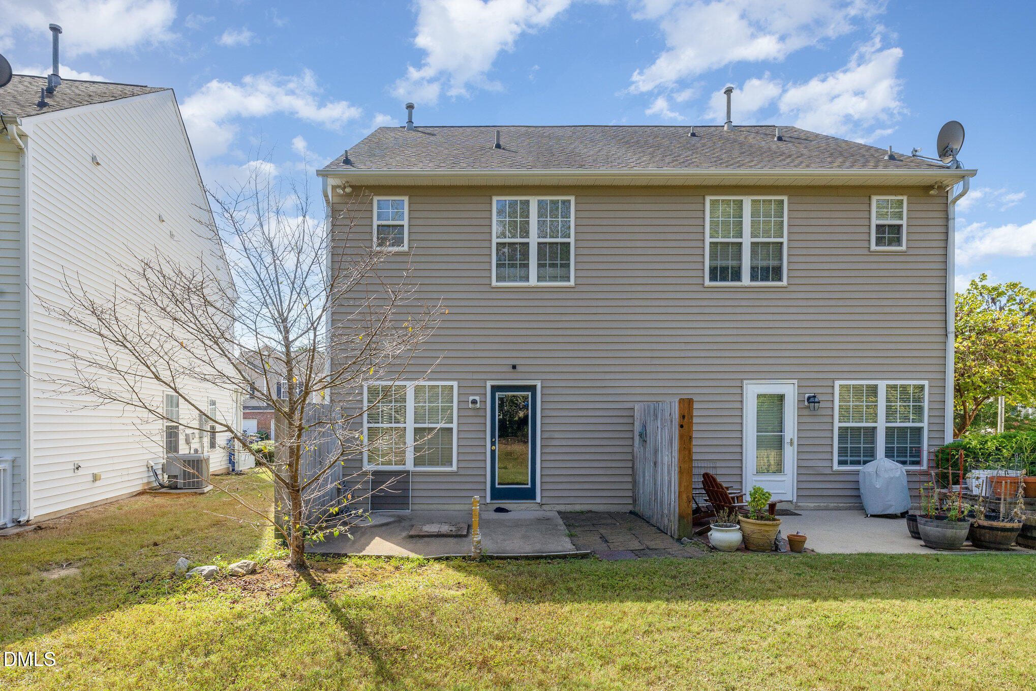 2116 Metacomet Way Raleigh, NC 27604 - Photo 23 of 24 a view of a house with a yard and sitting area