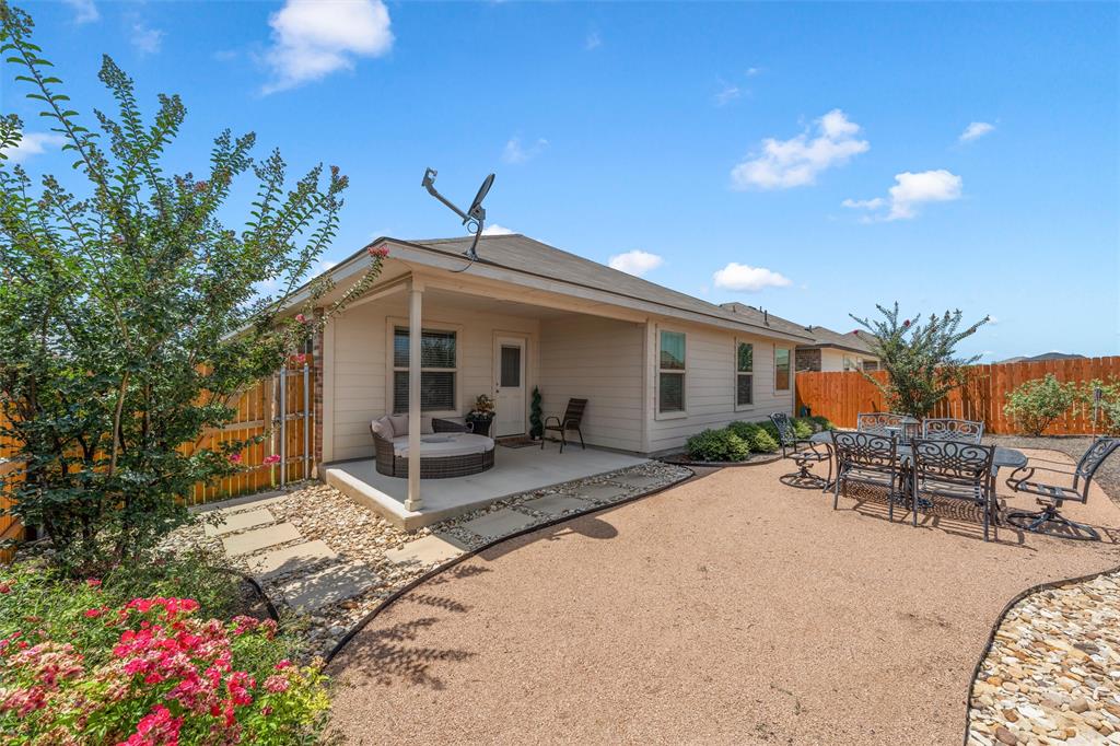 2912 Brosnan Road Lorena, TX 76655 - Photo 24 of 25 a view of a house with backyard and sitting area