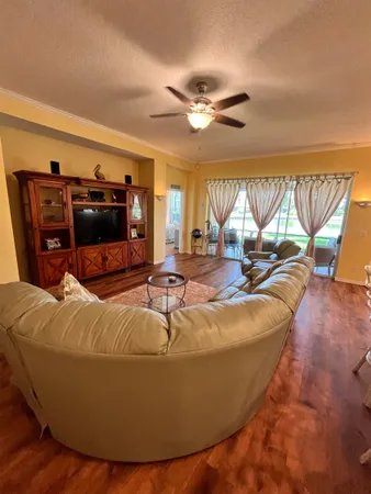 a room with furniture and flat screen tv