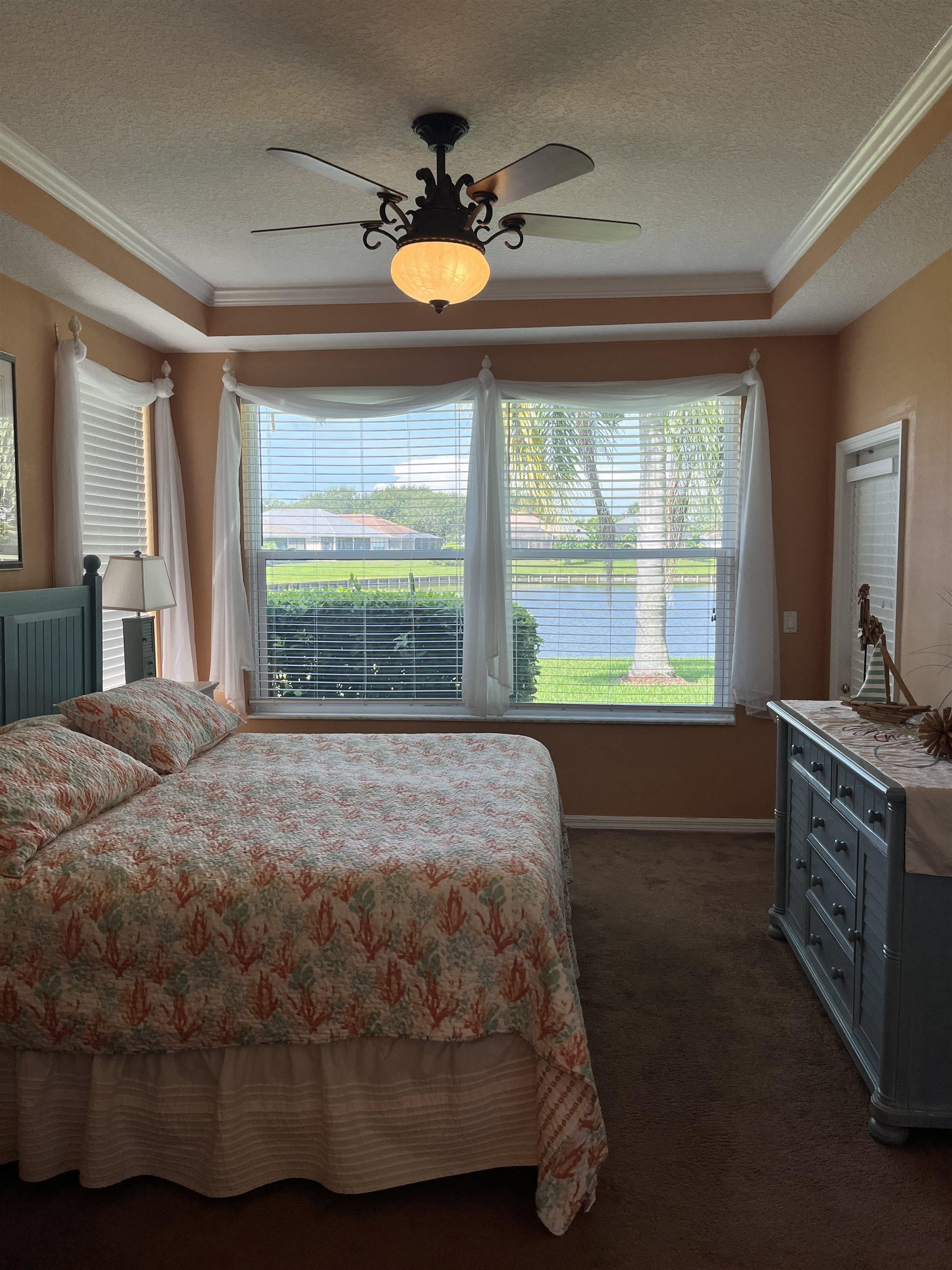 613 Casa Fuerta Lane St. Augustine, FL 32080 - Photo 16 of 23 a bedroom with a bed and a large window