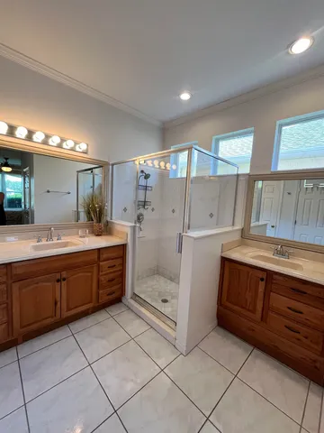 a bathroom with a sink a vanity and mirror