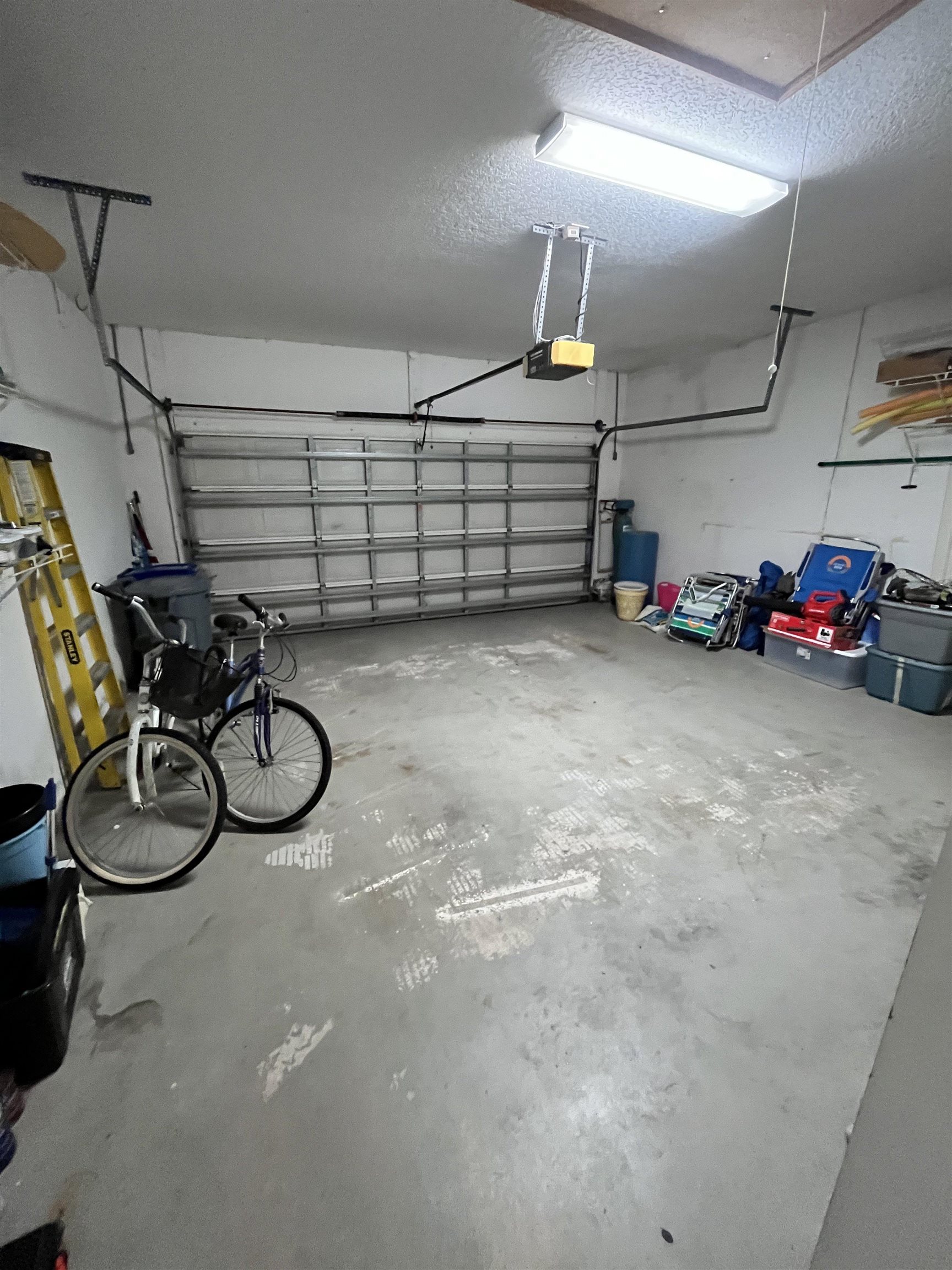 613 Casa Fuerta Lane St. Augustine, FL 32080 - Photo 20 of 23 a view of a garage with rack and bicycle