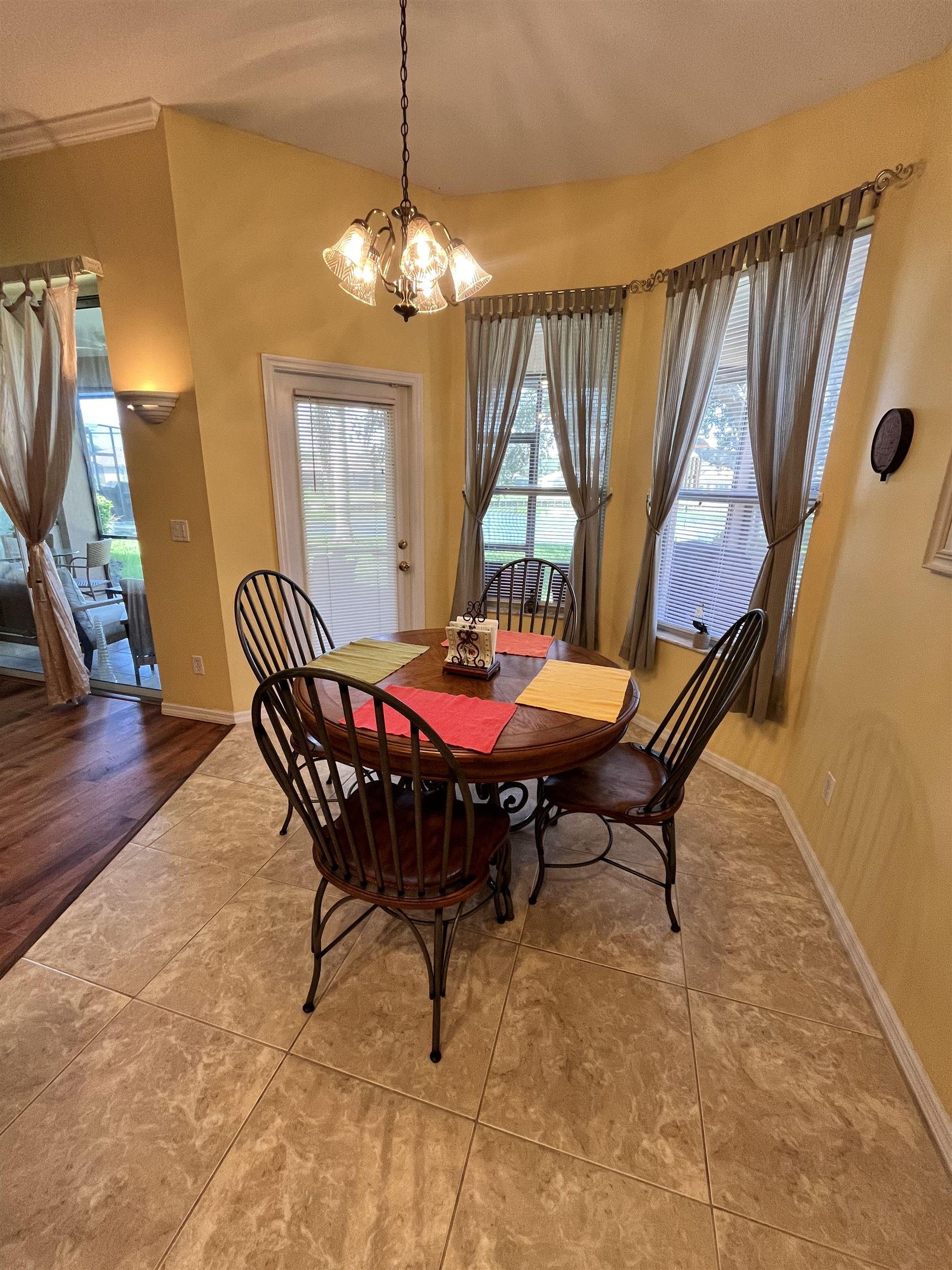 613 Casa Fuerta Lane St. Augustine, FL 32080 - Photo 10 of 23 a dining room with furniture and window
