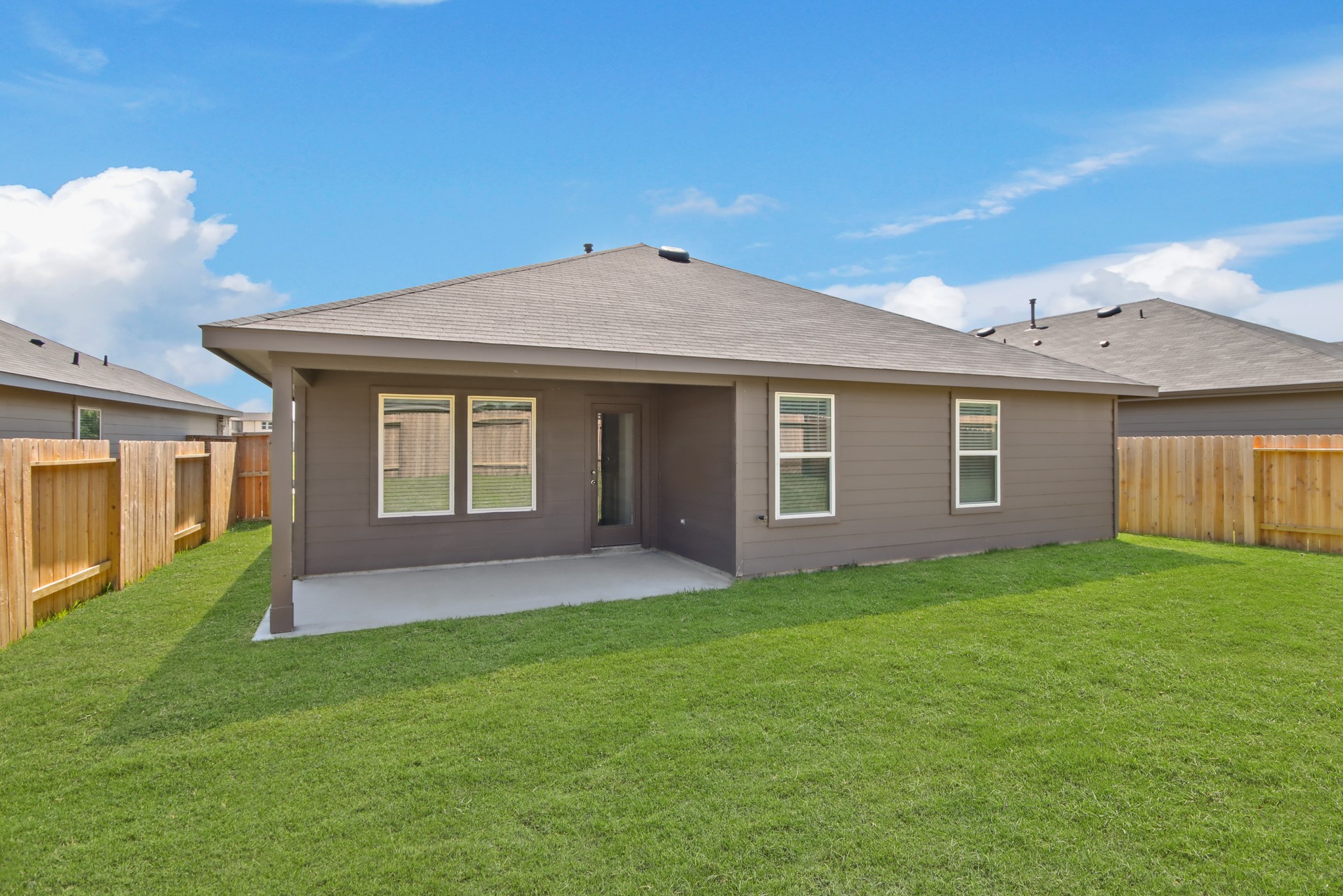 14380 Oceanblue Way Splendora, TX 77372 - Photo 13 of 24 a front view of a house with a garden