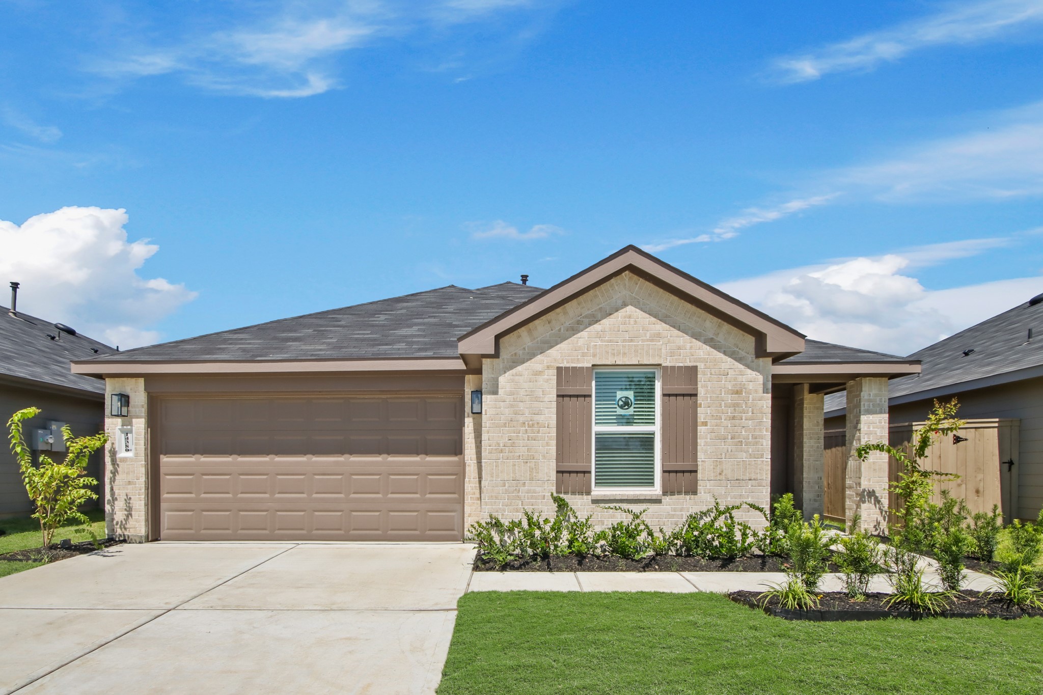 14380 Oceanblue Way Splendora, TX 77372 - Photo 2 of 24 a front view of a house with a yard and garage