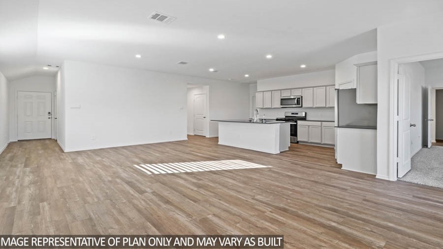 14380 Oceanblue Way Splendora, TX 77372 - Photo 6 of 24 a view of kitchen appliances wooden floor and windows