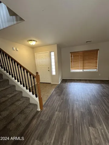 a view of entryway with wooden floor