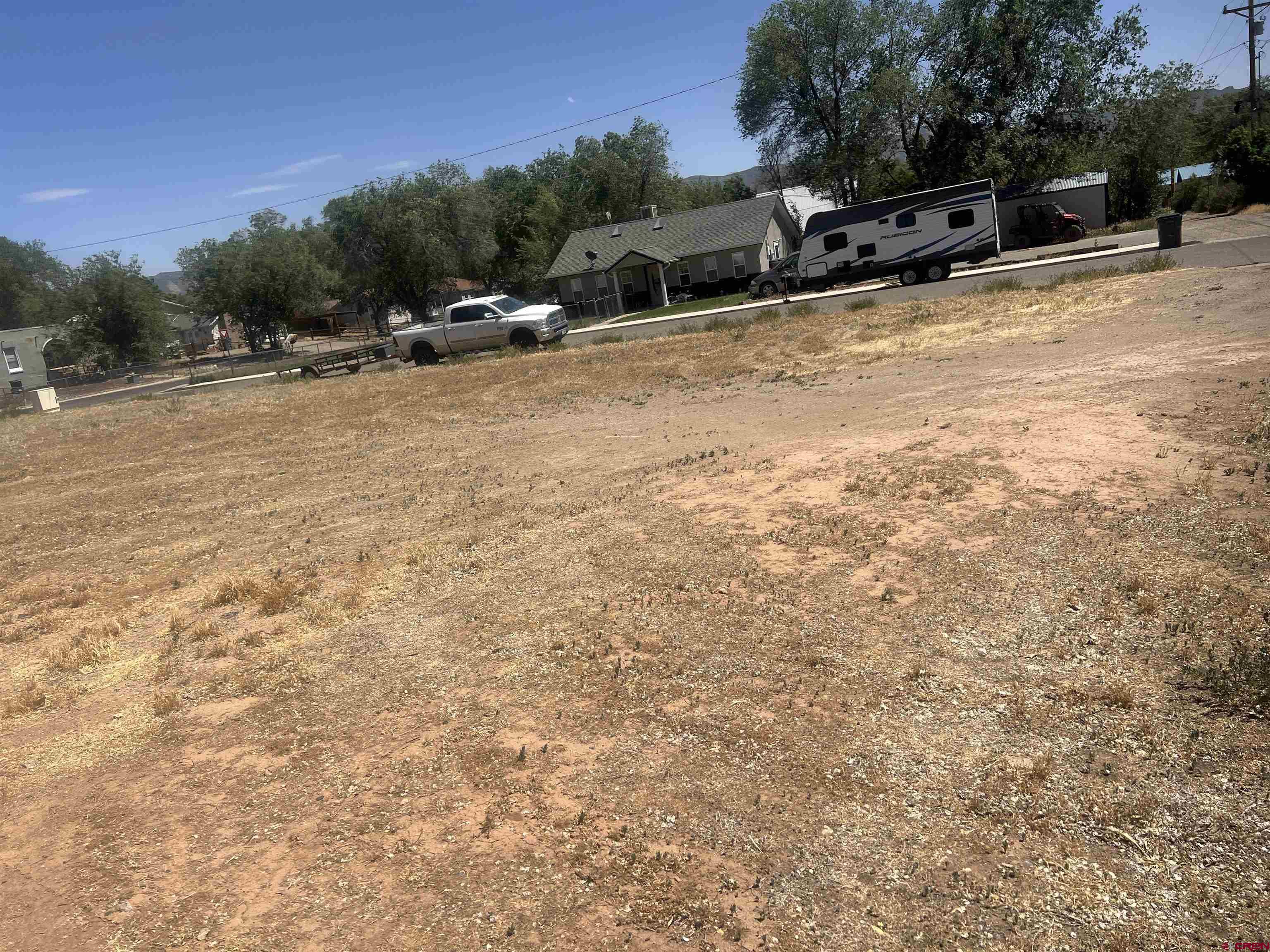 Tbd South Chestnut Street Cortez, CO 81321 - Photo 5 of 10 a view of a yard with a bench