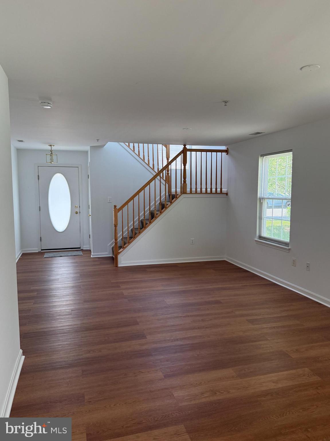 201 Canvasback Way Cambridge, MD 21613 - Photo 7 of 14 Living Room to Stairway