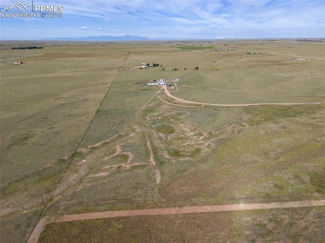 0 Big Springs Road Rush, CO 80833 - Photo 9 of 12 View of property location featuring rural landscape and a mountainous background