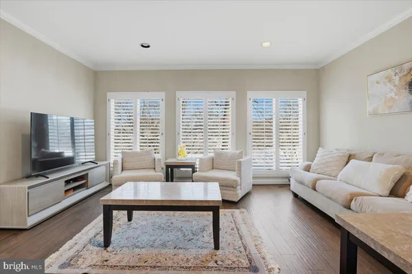 a view of a dining room with furniture and window