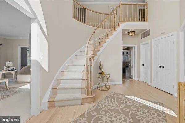 a view of a livingroom with furniture and a flat screen tv