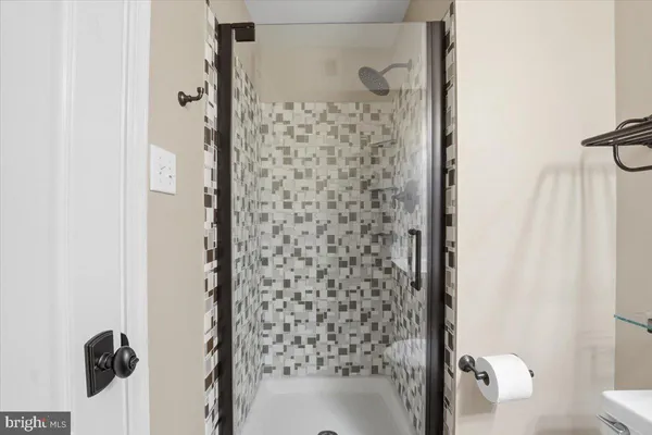 a bathroom with a bathtub and window