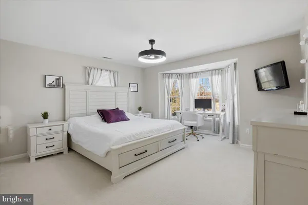 a room with pool table and a flat screen tv