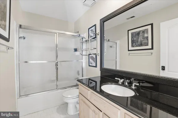 a view of balcony with wooden floor and fence