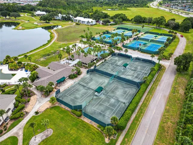 an aerial view of a house with a ocean view