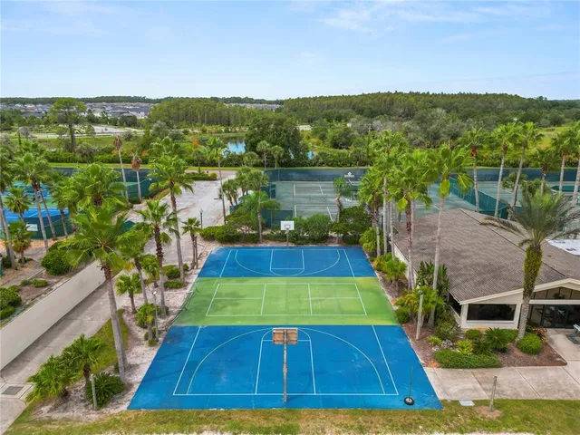 a view of a swimming pool with a lounge chairs