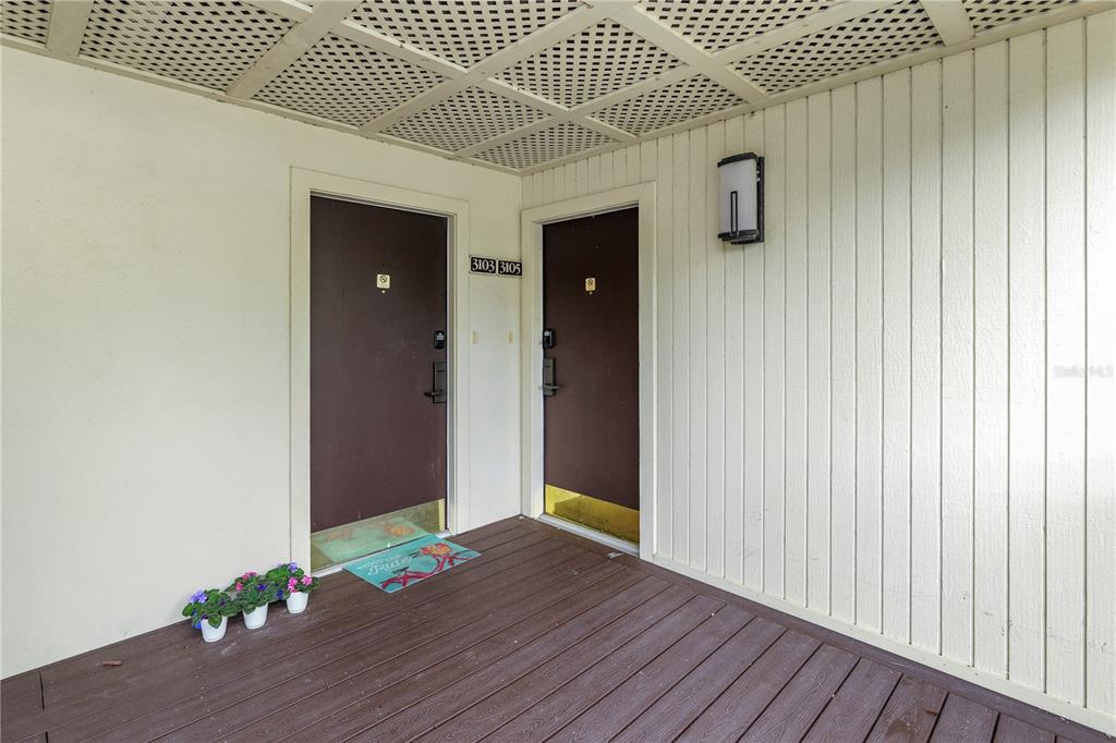 4947 Mill Pond Road, Unit 3103 & 3105 Wesley Chapel, FL 33543 - Photo 2 of 46 a view of an empty room with wooden floor