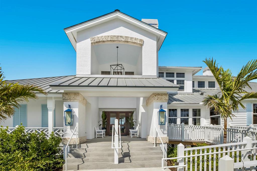 641 Boca Bay Drive Boca Grande, FL 33921 - Photo 62 of 74 front view of a house with a white door