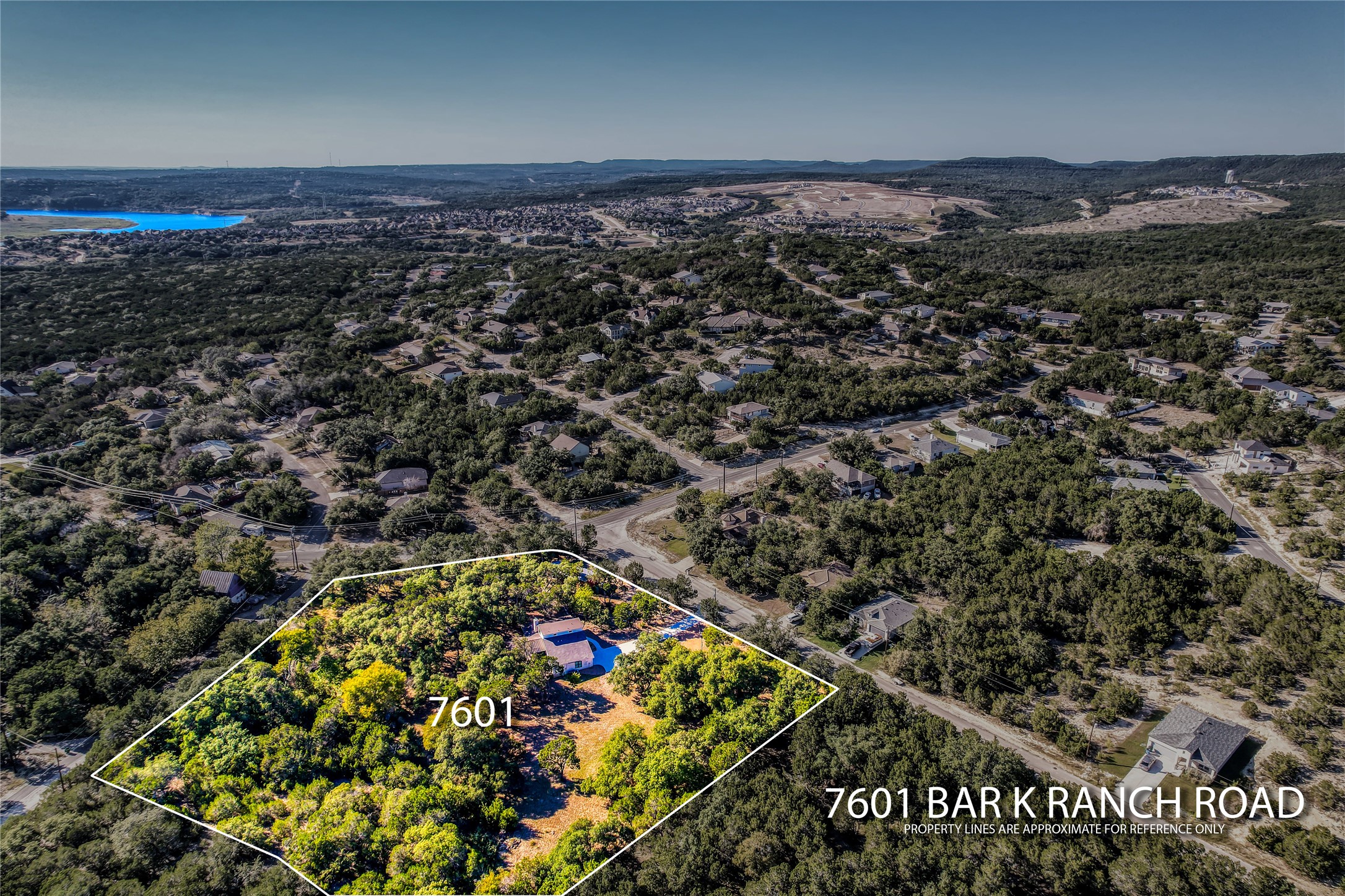 7601 Bar K Ranch Road Lago Vista, TX 78645 - Photo 33 of 38 Drone / aerial view featuring a water view