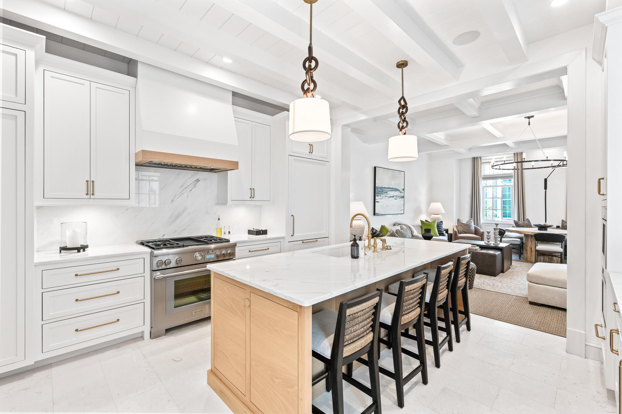 16 Smugglers Alley Inlet Beach, Unit BB6 Inlet Beach, FL 32461 - Photo 13 of 57 a kitchen with a stove a table and chairs in it