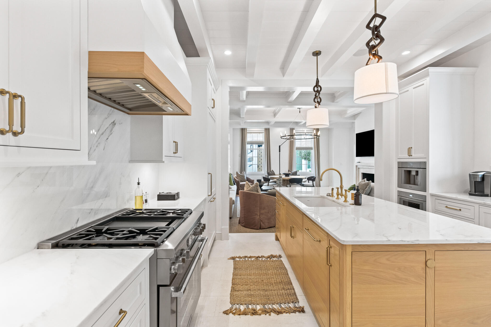 16 Smugglers Alley Inlet Beach, Unit BB6 Inlet Beach, FL 32461 - Photo 14 of 57 a kitchen with stainless steel appliances a stove a sink dishwasher and white cabinets with wooden floor