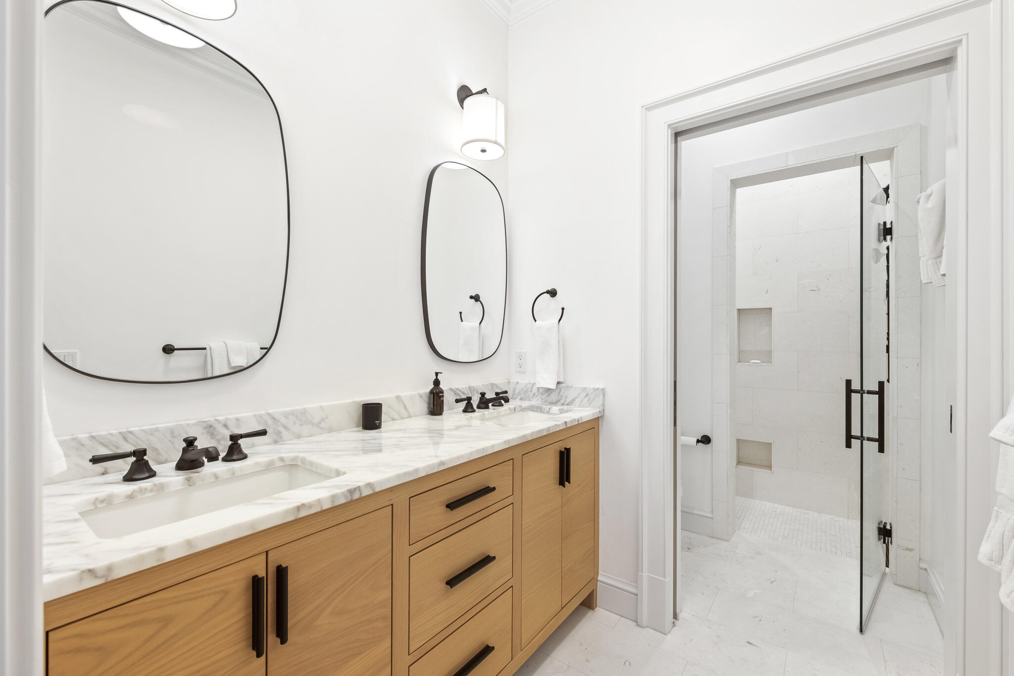 16 Smugglers Alley Inlet Beach, Unit BB6 Inlet Beach, FL 32461 - Photo 25 of 57 a bathroom with a double vanity sink and a mirror