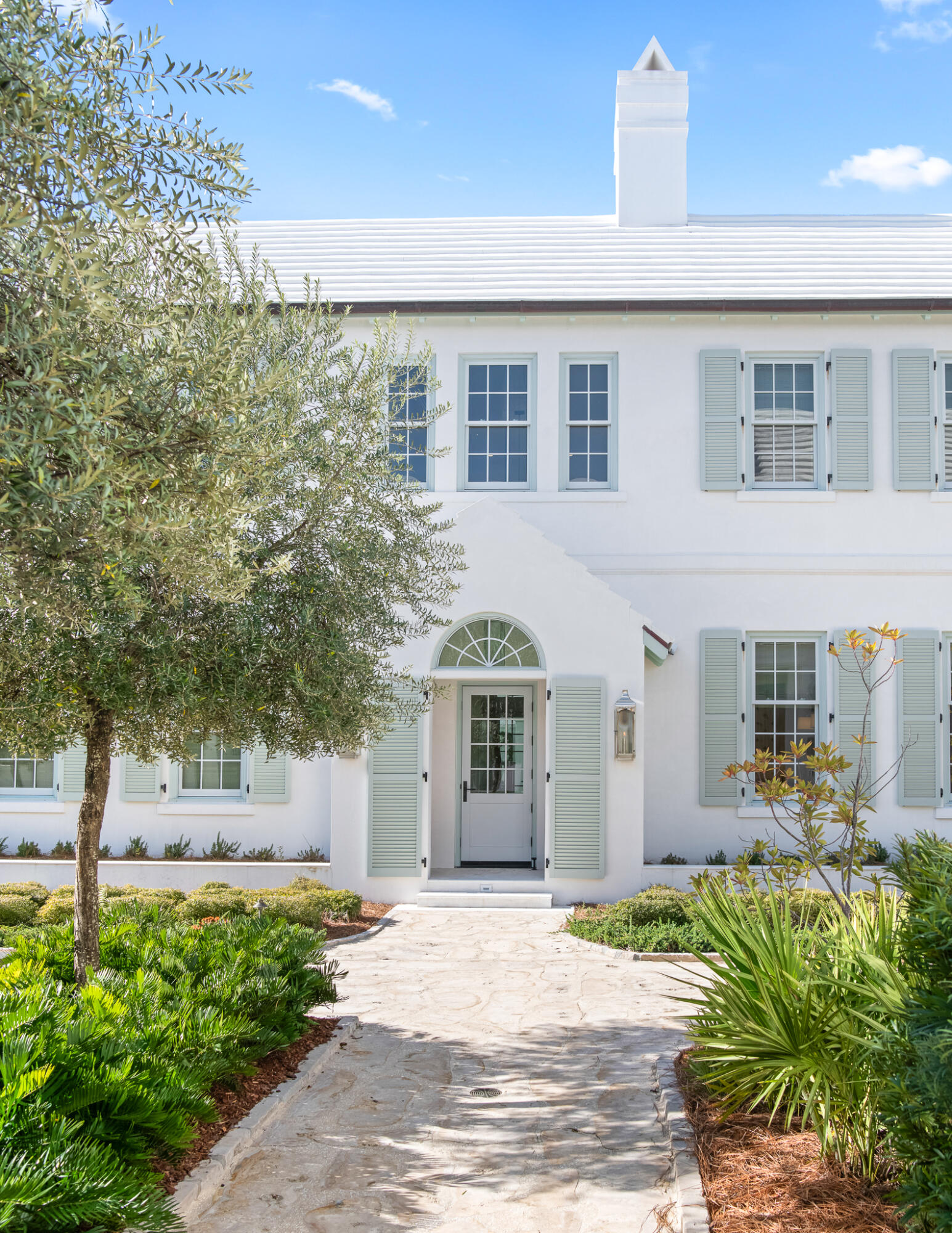 16 Smugglers Alley Inlet Beach, Unit BB6 Inlet Beach, FL 32461 - Photo 4 of 57 a front view of a house with garden