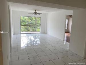 4166 Inverrary Drive, Unit 303 Lauderhill, FL 33319 - Photo 12 of 12 a view of an empty room with a window