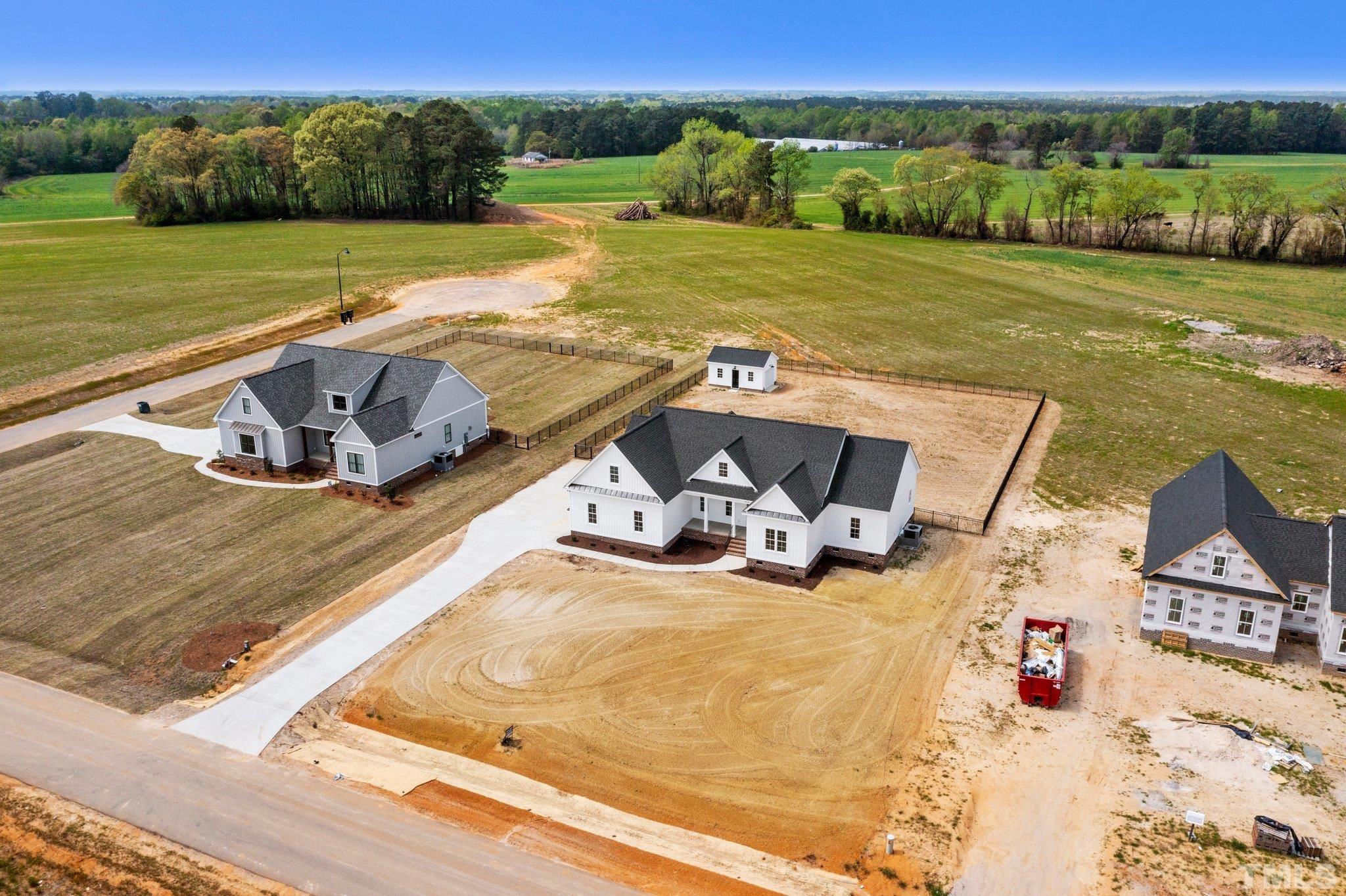 5748 Harvest Rdg Road Battleboro, NC 27809 - Photo 12 of 44 a view of a lake with a yard