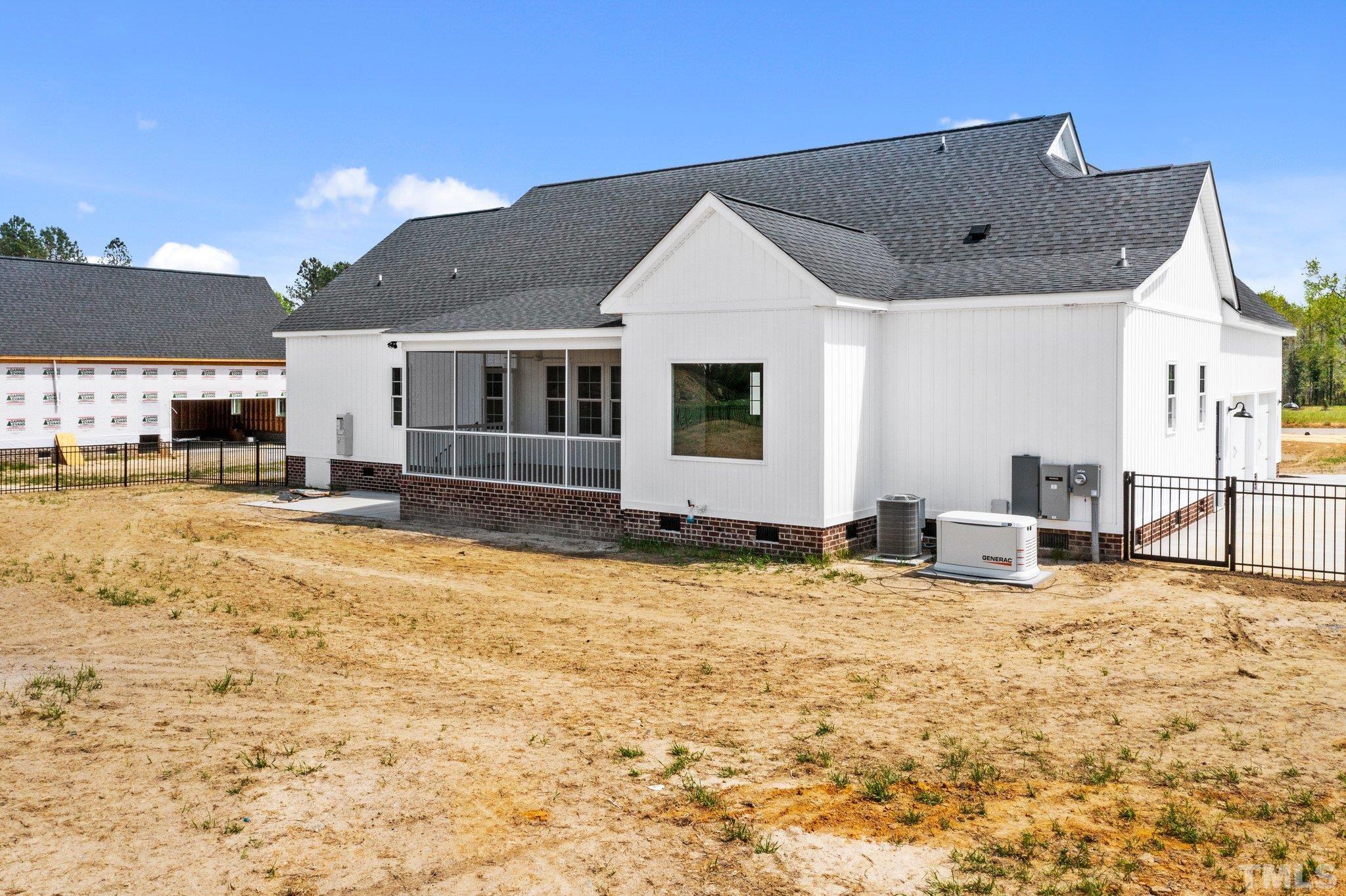 5748 Harvest Rdg Road Battleboro, NC 27809 - Photo 14 of 44 a view of a house with a swimming pool