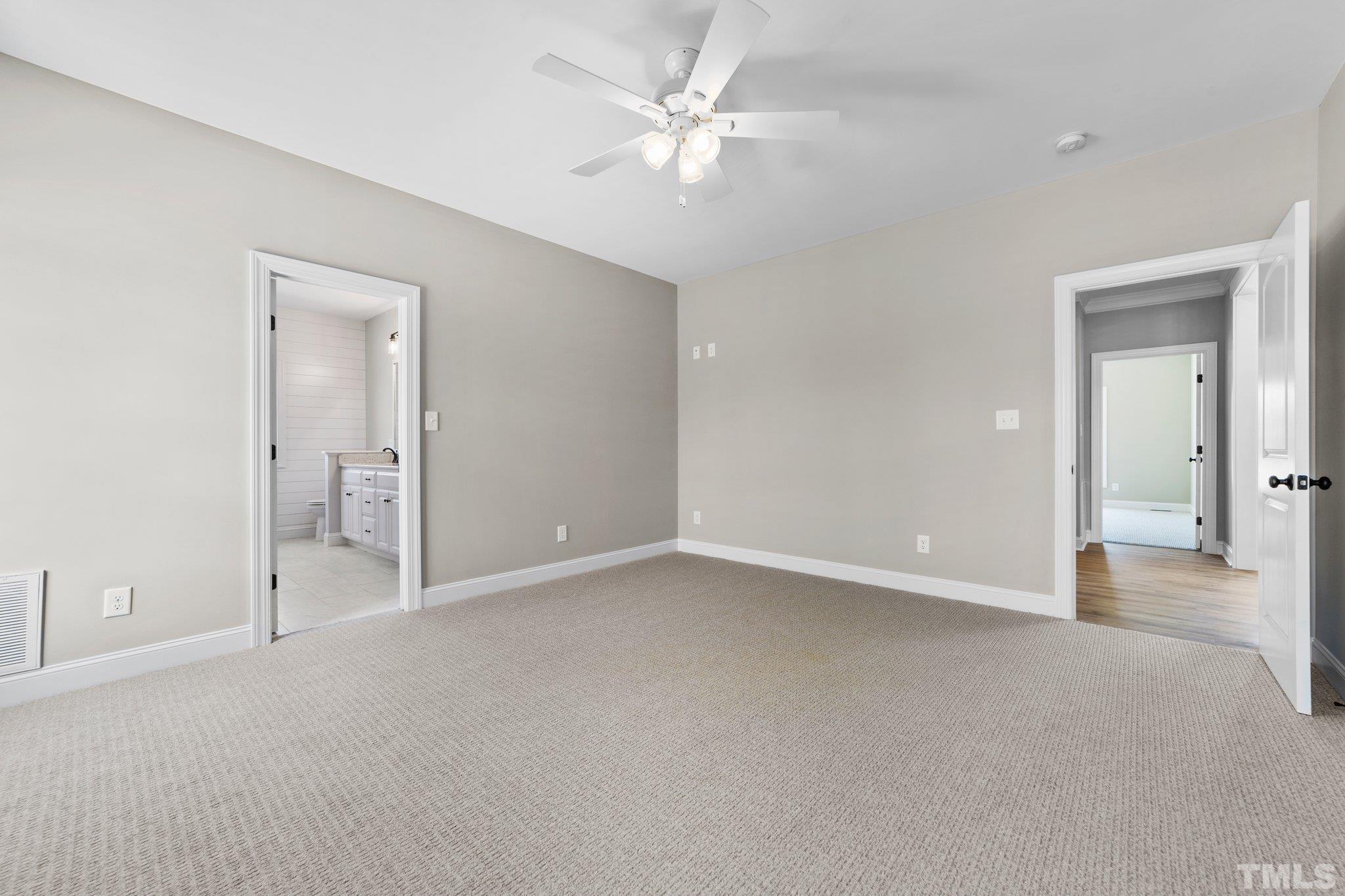 5748 Harvest Rdg Road Battleboro, NC 27809 - Photo 23 of 44 an empty room with fan and entrance