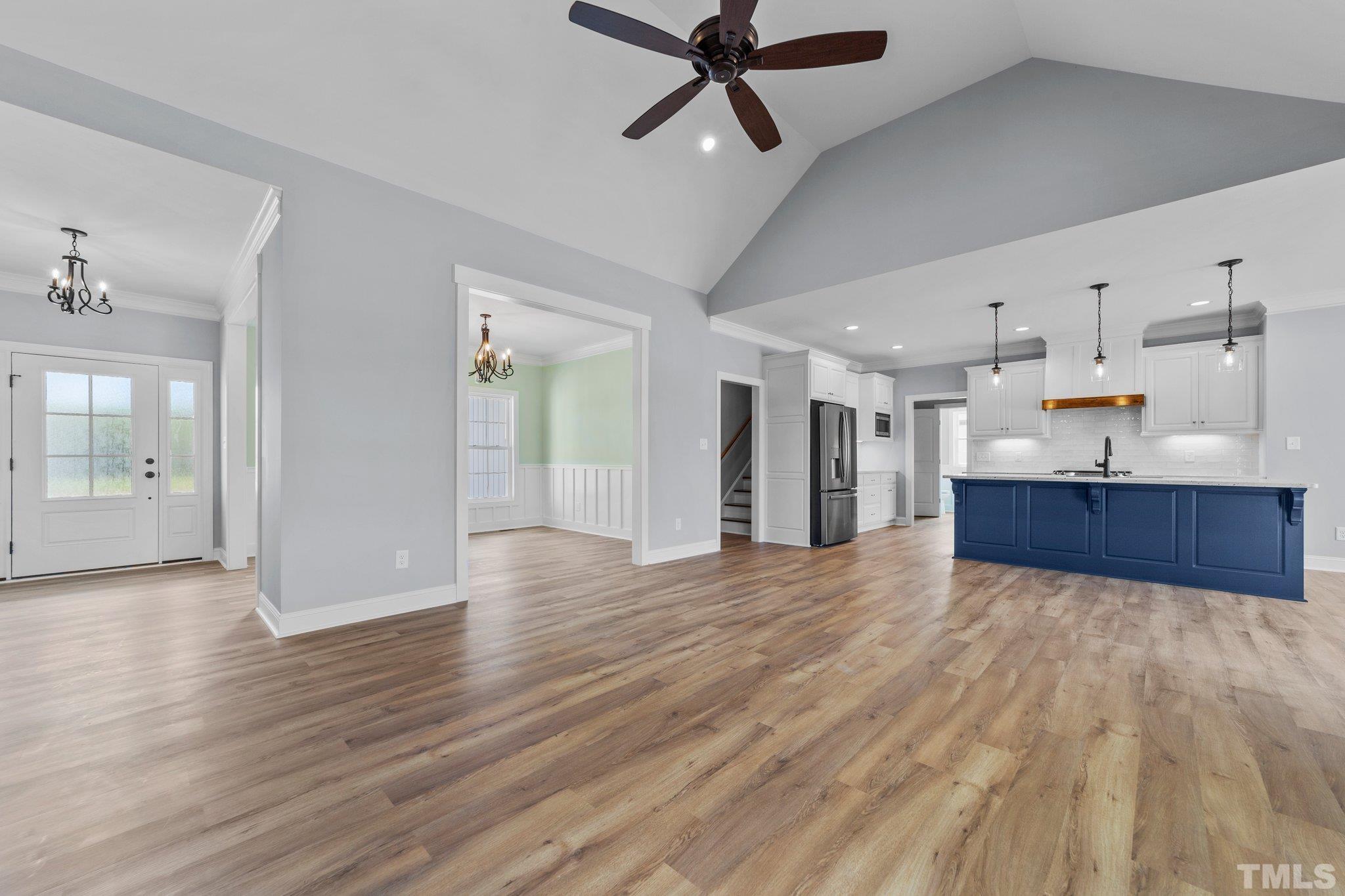 5748 Harvest Rdg Road Battleboro, NC 27809 - Photo 32 of 44 a view of a room with wooden floor and windows