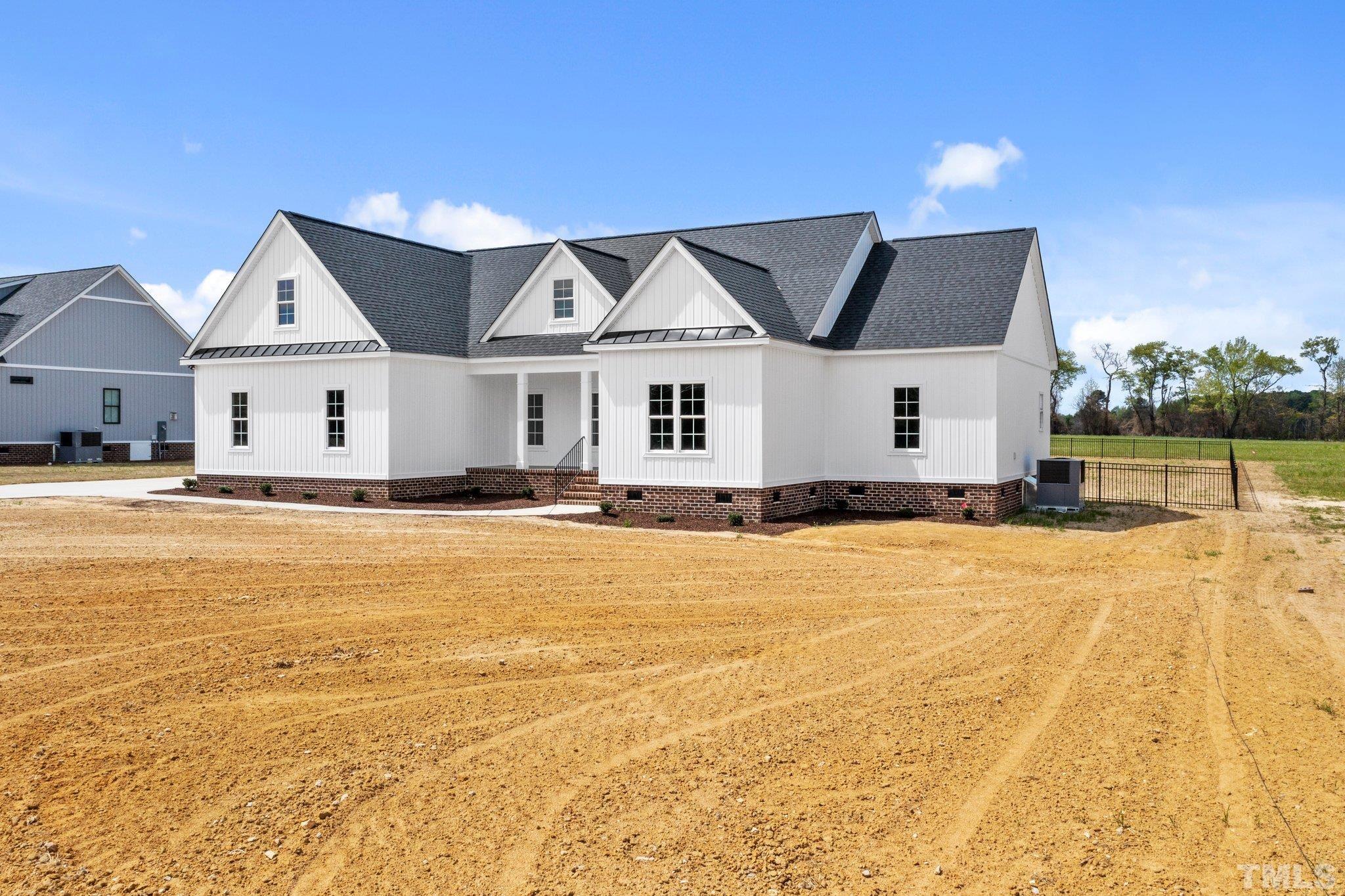 5748 Harvest Rdg Road Battleboro, NC 27809 - Photo 6 of 44 a view of a house with swimming pool