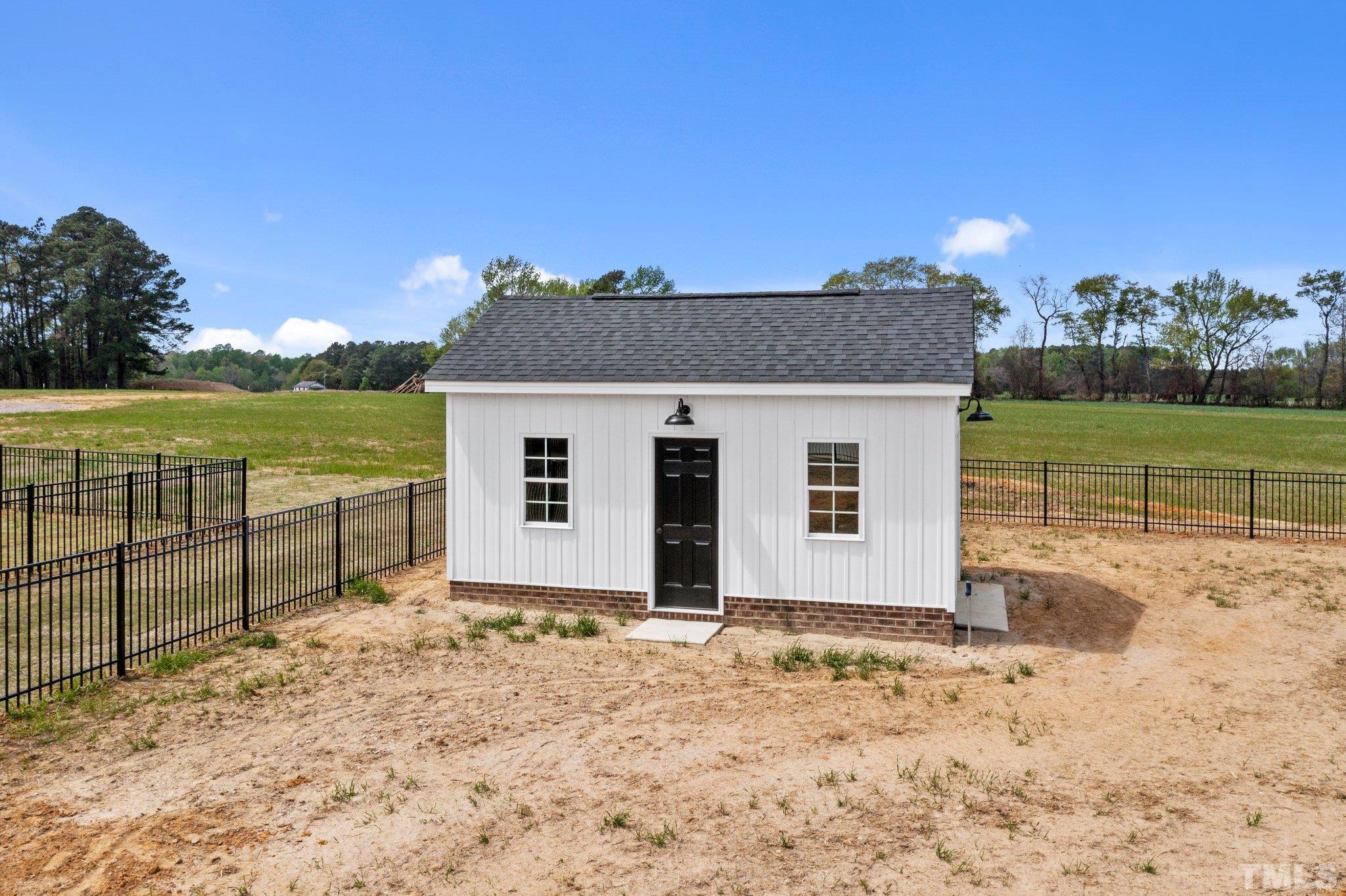 5748 Harvest Rdg Road Battleboro, NC 27809 - Photo 9 of 44 a view of a house with a ocean view