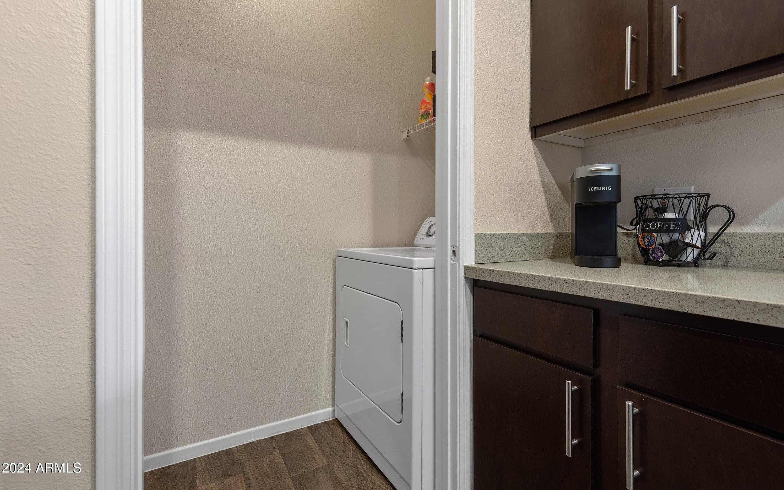 3625 East Ray Road, Unit 3 Phoenix, AZ 85044 - Photo 9 of 30 a kitchen with a sink and cabinets