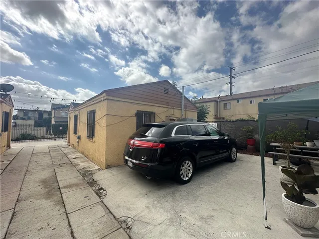 a car parked in front of a house