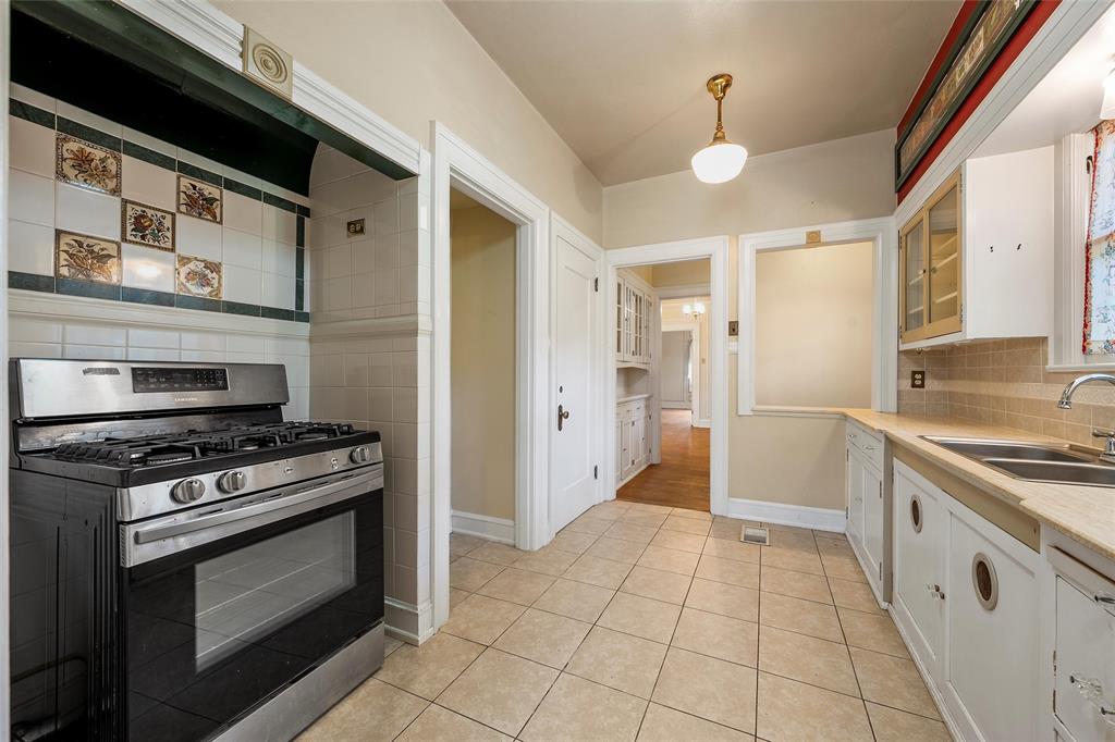 2228 Parrott Avenue Waco, TX 76707 - Photo 9 of 23 a kitchen with a stove and a sink
