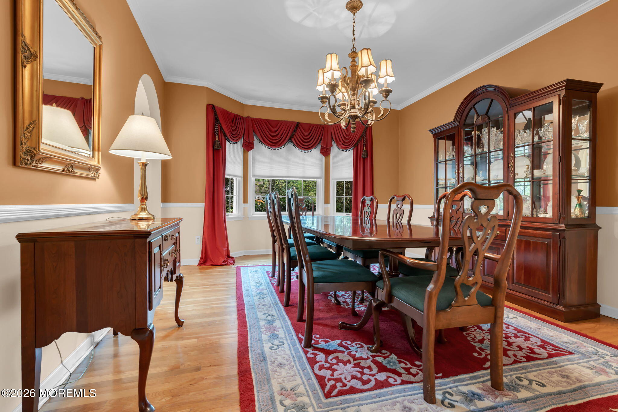 4 Quaker Hill Road Jackson, NJ 08527 - Photo 19 of 70 a view of a dining room with furniture a chandelier and wooden floor