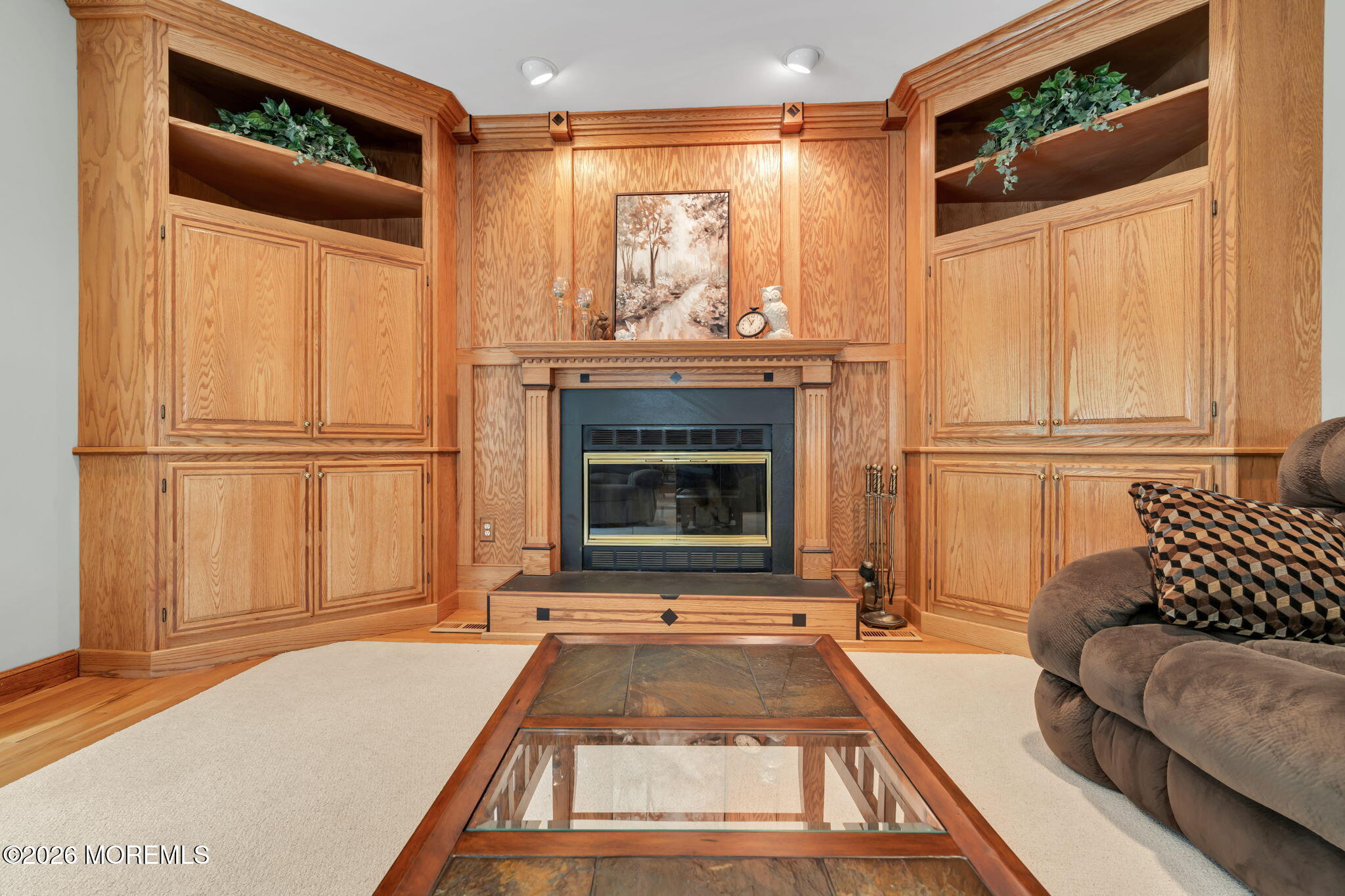 4 Quaker Hill Road Jackson, NJ 08527 - Photo 21 of 70 a living room with furniture and a fireplace
