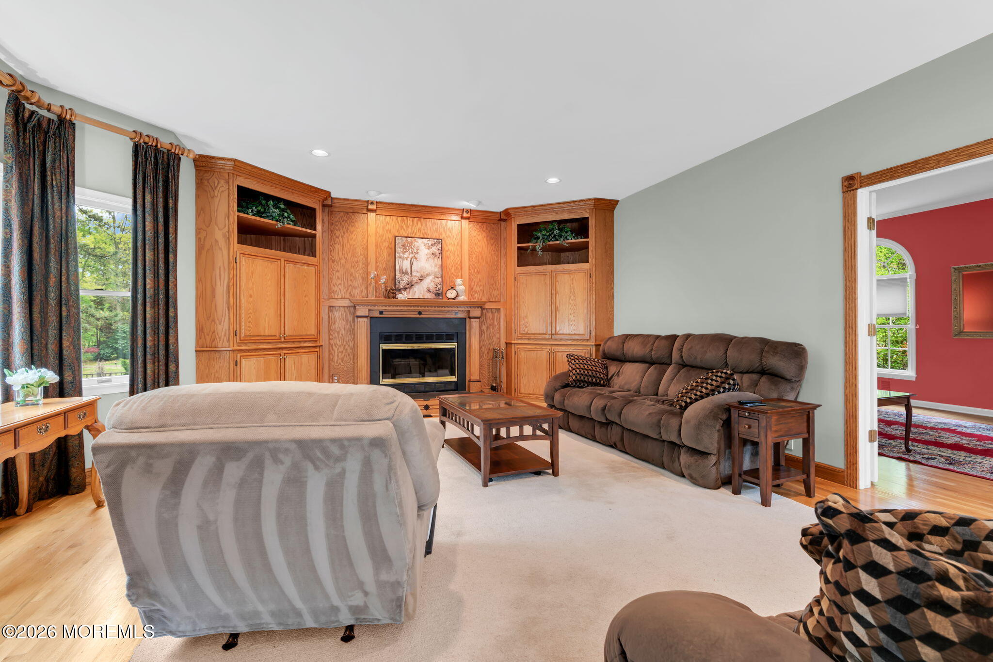 4 Quaker Hill Road Jackson, NJ 08527 - Photo 22 of 70 a living room with furniture and a fireplace