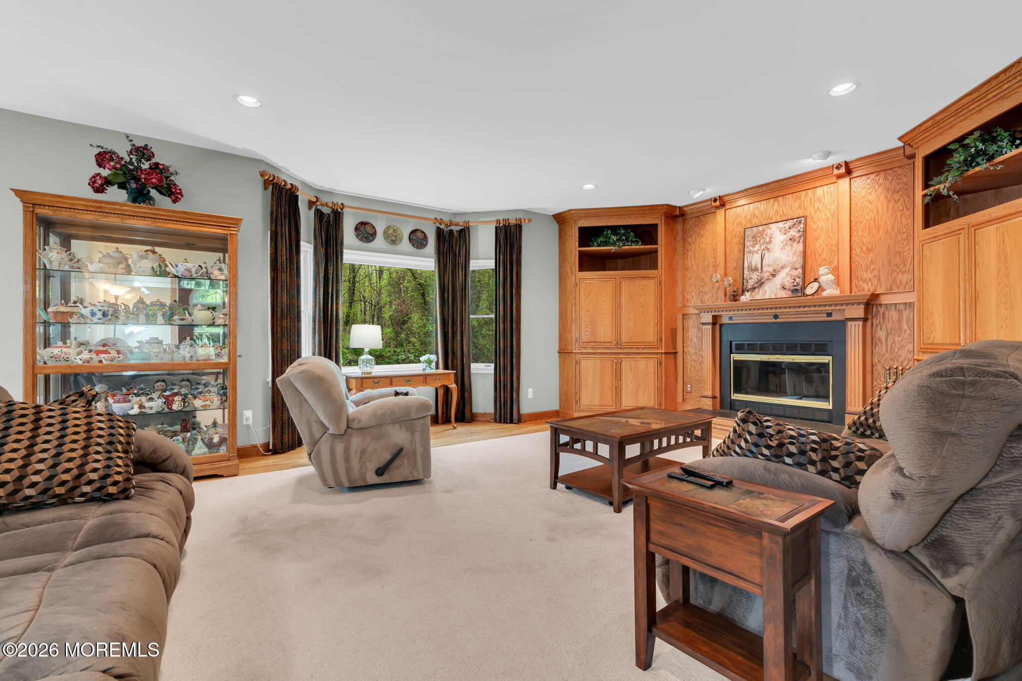 4 Quaker Hill Road Jackson, NJ 08527 - Photo 24 of 70 a living room with furniture large window and flat screen tv