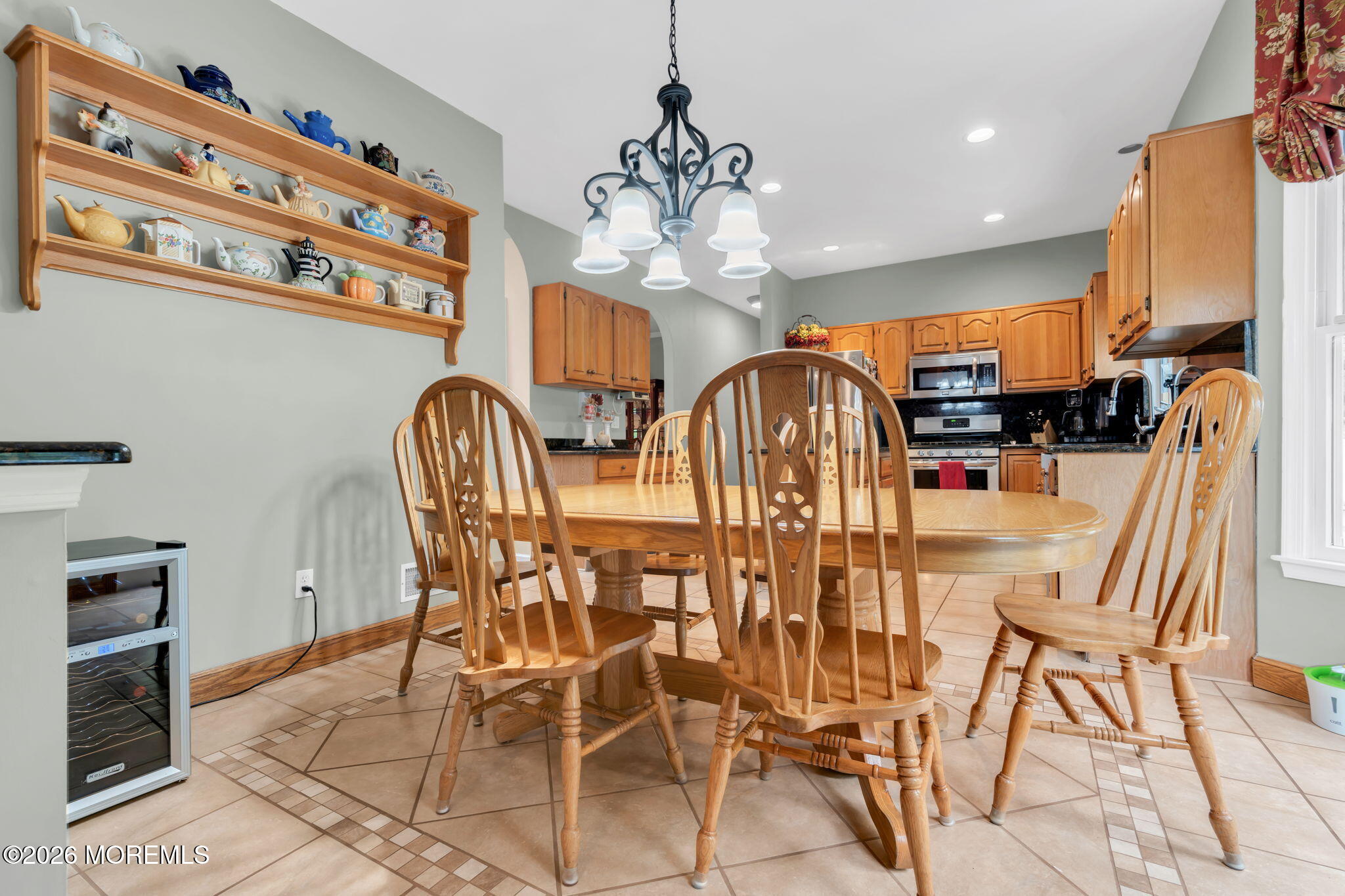 4 Quaker Hill Road Jackson, NJ 08527 - Photo 28 of 70 a dining room with furniture and chandelier