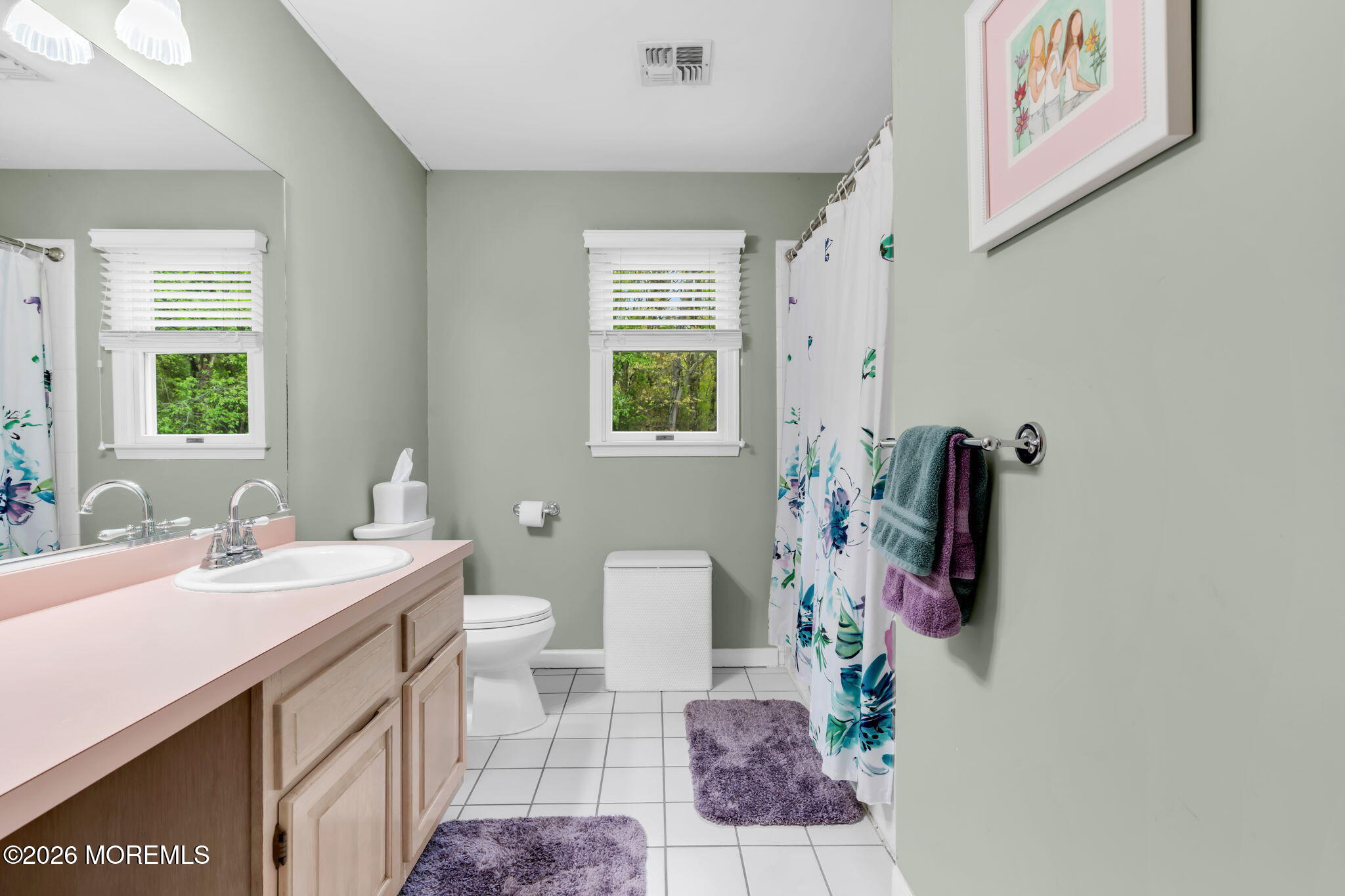 4 Quaker Hill Road Jackson, NJ 08527 - Photo 37 of 70 a bathroom with a sink a toilet and a window